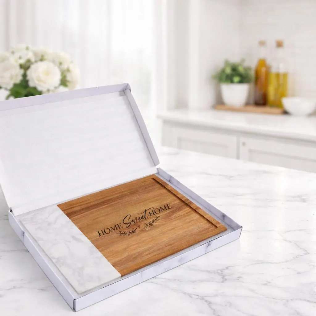 Personalized marble and wood cutting board with laser engraved design in gift box